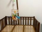 Height-Adjustable Wooden Baby Cot