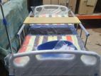 Four-Function Manual Bed with Lateral Tilt and Sanitary Functionality
