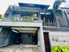 Fully Furnished 4-Bed Home with Roof Garden Parking