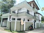 ගඩොලින් තැනූ තෙමහල් Brand New Luxury House For Sale In Piliyandala .