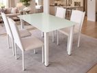 Glass Top Dining Table with cushion Chairs