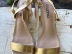 Gold heels