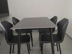 granite dining table with chairs