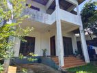 ඉඩමේ ම්ලට නිවසක් House for sale between Kiribathgoda town and Kadawataha