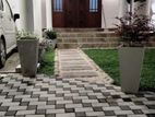 Interlock Paving and Grass Planting.