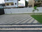 Interlock Paving Design with Malaysian Garden Grass Landscaping