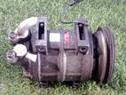 ISUZU 4HF1 AC COMPESER