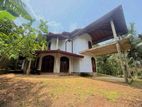 කාපට් පාරට මුහුනලා පර්චස් 23ක වටිනා ඉඩමක් සමඟ අඩක් නිම කළ අලංකාර නිවසක්