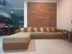 L Shaped Sofa with Throw Pillows