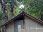 Land with small house for sale