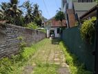 Land with a house for sale