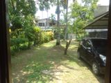 Land with A House for Sale in Angoda