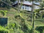 Land with a house for sale In Bowalawatta
