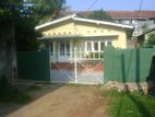 Land with house for sale