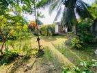 Land with House for Sale in Piliyandala 100M to Bus Root WR0520