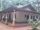 Land with House for Sale in Poramadala
