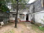 land with old two story house for sale