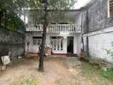 land with old two story house for sale