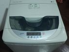 Lg 6.5kg top loading washing machine.