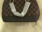 Louis Vuitton Alma BB Handbag