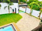 Luxurious Trees Storey House for Sale in Talawatugoda