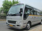 luxury bus for hire and tours coaster rosa AC