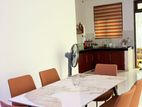 luxury dining table with cushion chairs