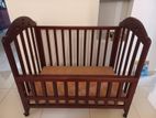 Mahogany Baby Cot with Lockable Wheels
