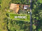 Main Road Facing Land with Commercial Potential