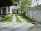 Malaysian Garden Grass and Interlock Paving