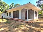Massive 24-Perch Land with Unfinished House for Sale in Udugampola