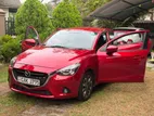 Mazda 2 Sedan Car for Rent