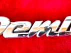 MAZDA DEMIO DICKY BADGE