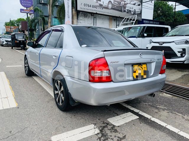 Mazda Familia 1999 photo 3