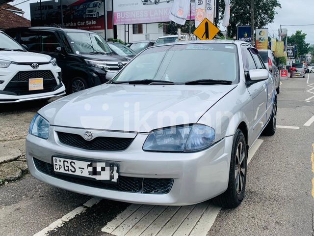Mazda Familia 1999 photo 4
