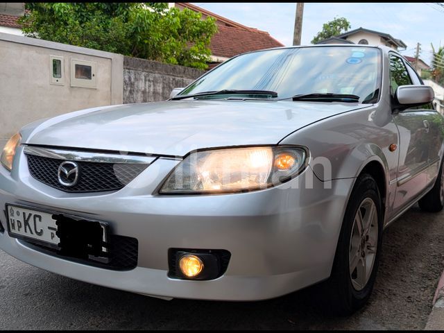 Mazda Familia 2003 photo 2