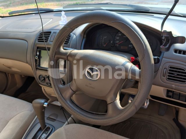 Mazda Familia 2003 photo 3