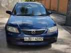 Mazda Familia Bj5 P 2001 (auto) - Rent a Car