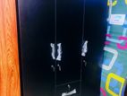 Melamine Black Three Door Wardrobe with Bottom Drawers