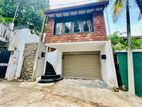 Modern 4BR Family Home with Gardens and Garage – Rajagiriya