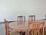 Modern 8-Seater Dining Table with 8 Cushioned Chairs