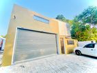 Modern House with Rooftop Terrace and Double Car Porch in Thalawathugoda