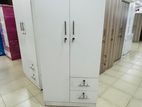 Modern melamine white almari with drawers