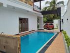 Modern swimming pool with 5 bedrooms House for Sale gorakapitiya