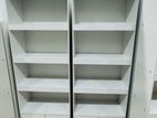 Modern white book racks with doors