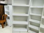 Modern white book racks with doors