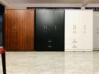 New 3 Door Black Melamine Wardrobes .
