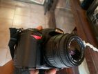 Nikon D7000 DSLR body with lens