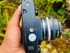 Nikon em