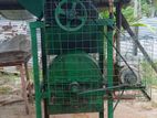 Coconut husk cutting machine